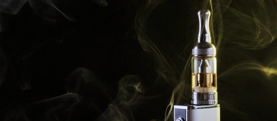 electronic cigarette over a gray background